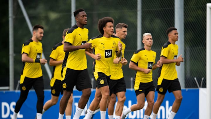 BAD RAGAZ, SWITZERLAND - AUGUST 10: Dan-Axel Zagadou of Dortmund (L) and Axel Witsel of Dortmund warm up during day 1 of the pre-season summer training camp of Borussia Dortmund on August 10, 2020 in Bad Ragaz, Switzerland. (Photo by Daniel Kopatsch/Getty Images)