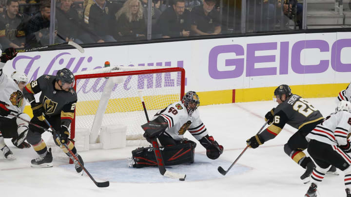 LAS VEGAS, NV – NOVEMBER 13: Chicago Blackhawks goaltender Corey Crawford (50) pokes at the puck during a regular season game against the Vegas Golden Knights Wednesday, Nov. 13, 2019, at T-Mobile Arena in Las Vegas, Nevada. (Photo by: Marc Sanchez/Icon Sportswire via Getty Images)