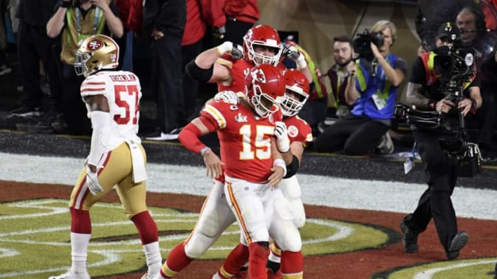 MIAMI, FLORIDA - FEBRUARY 02: Patrick Mahomes #15 of the Kansas City Chiefs celebrates after he scored a touchdown against the San Francisco 49ers in Super Bowl LIV at Hard Rock Stadium on February 02, 2020 in Miami, Florida. The Chiefs won the game 31-20. (Photo by Focus on Sport/Getty Images)