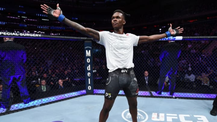 NEW YORK, NY - NOVEMBER 03: Israel Adesanya of Nigeria celebrates his TKO victory over Derek Brunson in their middleweight bout during the UFC 230 event inside Madison Square Garden on November 3, 2018 in New York, New York. (Photo by Jeff Bottari/Zuffa LLC/Zuffa LLC via Getty Images)