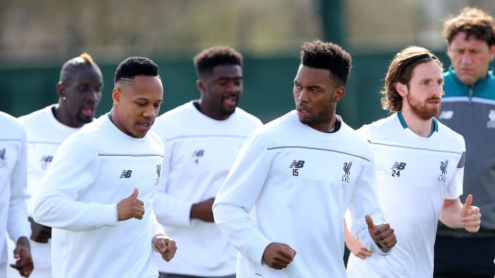 LIVERPOOL, ENGLAND – APRIL 13: Nathaniel Clyne and Daniel Sturridge of Liverpool warm up during a training session ahead of the UEFA Europa League quarter final between Liverpool and Borussia Dortmund at Melwood Training Ground on April 13, 2016 in Liverpool, England. (Photo by Dave Thompson/Getty Images)