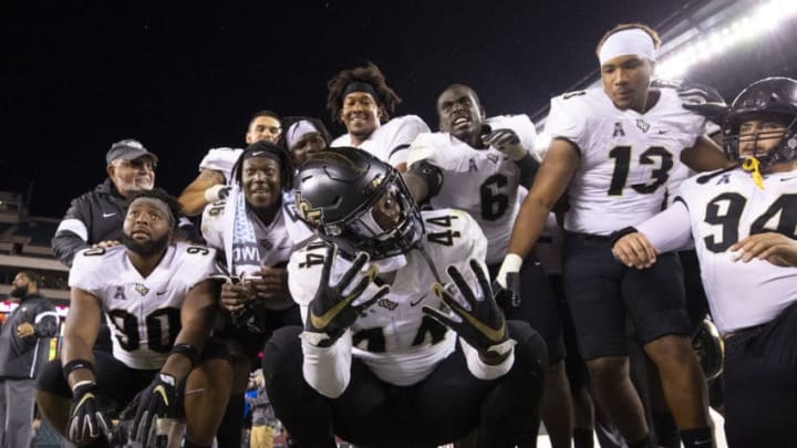 PHILADELPHIA, PA - OCTOBER 26: Members of the UCF Knights pose for a picture in the fourth quarter against the Temple Owls at Lincoln Financial Field on October 26, 2019 in Philadelphia, Pennsylvania. The UCF Knights defeated the Temple Owls 63-21. (Photo by Mitchell Leff/Getty Images)