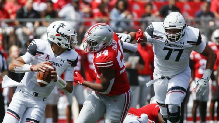 Ohio State Buckeyes defensive end Tyler Friday (54) tries to break free of Cincinnati Bearcats offensive lineman Vincent McConnell in a 2019 game at Ohio Stadium. Friday will miss most of the upcoming season because of an injury, coach Ryan Day said Wednesday.Osu19cin Jb Xtra 13