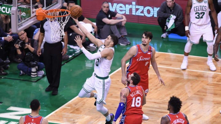 BOSTON, MA - APRIL 30: Jayson Tatum #0 of the Boston Celtics lays up a shot against Marco Belinelli #18 of the Philadelphia 76ers during Game One of the Eastern Conference Semifinals of the 2018 NBA Playoffs on April 30, 2018 at TD Garden on April 30, 2018 in Boston, Massachusetts. NOTE TO USER: User expressly acknowledges and agrees that, by downloading and or using this photograph, User is consenting to the terms and conditions of the Getty Images License Agreement. (Photo by Matteo Marchi/Getty Images) *** Local Caption *** Jayson Tatum; Marco Belinelli