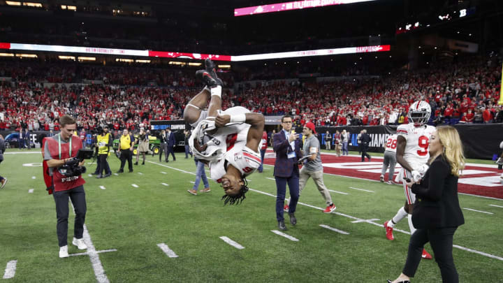INDIANAPOLIS, IN – DECEMBER 07: Jameson Williams #6 of the Ohio State Buckeyes celebrates after the win against the Wisconsin Badgers in the Big Ten Football Championship at Lucas Oil Stadium on December 7, 2019 in Indianapolis, Indiana. Ohio State defeated Wisconsin 34-21. (Photo by Joe Robbins/Getty Images)