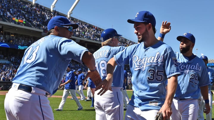 Kansas City Royals players Eric Hosmer (35) and Salvador Perez (13) celebrate -Mandatory Credit: Peter G. Aiken-USA TODAY Sports