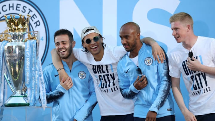 MANCHESTER, ENGLAND - MAY 14: Bernardo Silva , Leroy Sane, Fabian Delph and Kevin De Bruyne of Manchester City during the Manchester City Trophy Parade in Manchester city centre on May 14, 2018 in Manchester, England. (Photo by Lynne Cameron/Getty Images)