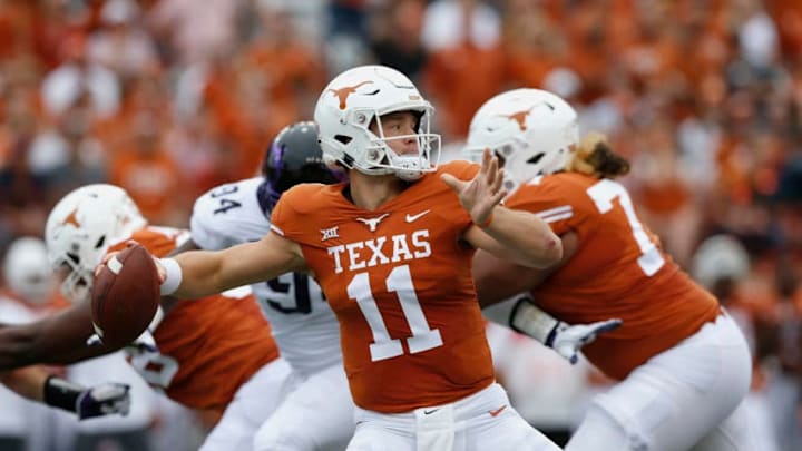 AUSTIN, TX - SEPTEMBER 22: Sam Ehlinger #11 of the Texas Longhorns throws a pass under pressure by Corey Bethley #94 of the TCU Horned Frogs in the second quarter at Darrell K Royal-Texas Memorial Stadium on September 22, 2018 in Austin, Texas. (Photo by Tim Warner/Getty Images) AUSTIN, TX - SEPTEMBER 22: Sam Ehlinger #11 of the Texas Longhorns throws a pass under pressure by Corey Bethley #94 of the TCU Horned Frogs in the second quarter at Darrell K Royal-Texas Memorial Stadium on September 22, 2018 in Austin, Texas. (Photo by Tim Warner/Getty Images)