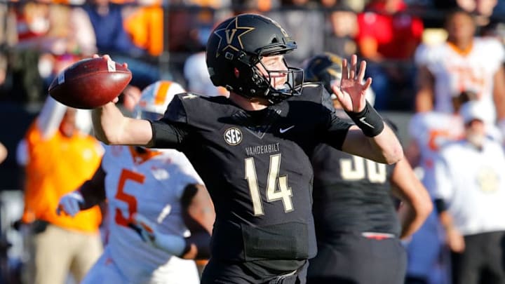 NASHVILLE, TN - NOVEMBER 24: Quarterback Kyle Shurmur #14 of the Vanderbilt Commodores drops back to throw a pass against the Tennessee Volunteers during the first half at Vanderbilt Stadium on November 24, 2018 in Nashville, Tennessee. (Photo by Frederick Breedon/Getty Images)