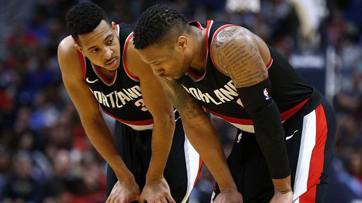 NEW ORLEANS, LA - MARCH 27: CJ McCollum #3 of the Portland Trail Blazers and Damian Lillard #0 talk during the second half against the New Orleans Pelicans at the Smoothie King Center on March 27, 2018 in New Orleans, Louisiana. NOTE TO USER: User expressly acknowledges and agrees that, by downloading and or using this photograph, User is consenting to the terms and conditions of the Getty Images License Agreement. (Photo by Jonathan Bachman/Getty Images)