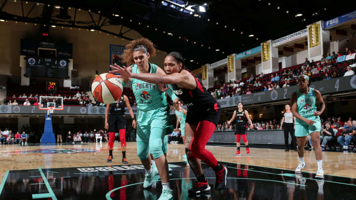 WHITE PLAINS, NY- JUNE 9: Amanda Zahui B. #17 of the New York Liberty and A’ja Wilson #22 of the Las Vegas Aces go after a loose ball on June 9, 2019 at the Westchester County Center, in White Plains, New York. NOTE TO USER: User expressly acknowledges and agrees that, by downloading and or using this photograph, User is consenting to the terms and conditions of the Getty Images License Agreement. Mandatory Copyright Notice: Copyright 2019 NBAE (Photo by Ned Dishman/NBAE via Getty Images)