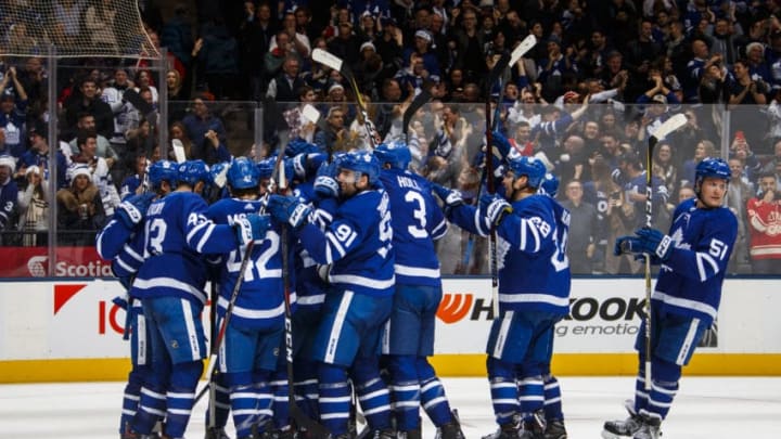 TORONTO, ON - DECEMBER 23: Toronto Maple Leafs celebrate their overtime win against the Detroit Red Wings at the Scotiabank Arena on December 23, 2018 in Toronto, Ontario, Canada. (Photo by Mark Blinch/NHLI via Getty Images)