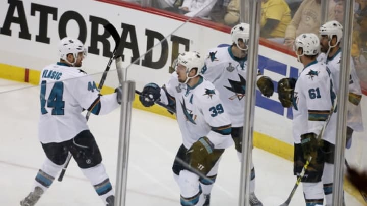 Jun 9, 2016; Pittsburgh, PA, USA; San Jose Sharks center Logan Couture (39) celebrates with teammates after scoring a goal against the Pittsburgh Penguins in the first period in game five of the 2016 Stanley Cup Final at Consol Energy Center. Mandatory Credit: Charles LeClaire-USA TODAY Sports