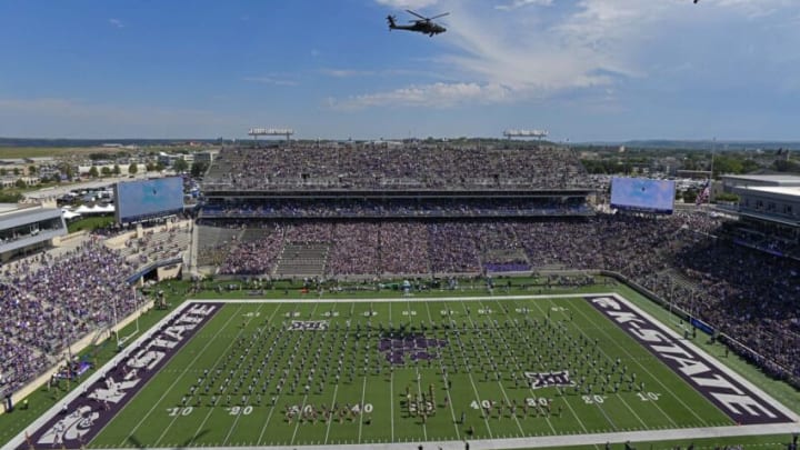 MANHATTAN, KS - SEPTEMBER 17: US Army Combat Apache helicopters fly over Bill Snyder Family Football Stadium before a game between the Kansas State Wildcats and Tulane Green Wave on September 17, 2022 in Manhattan, Kansas. (Photo by Peter Aiken/Getty Images)