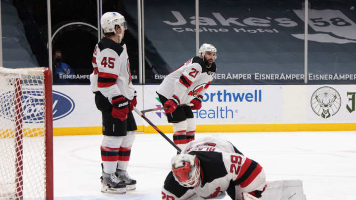 Sami Vatanen #45, Kyle Palmieri #21 and Mackenzie Blackwood #29 of the New Jersey Devils (Photo by Bruce Bennett/Getty Images)