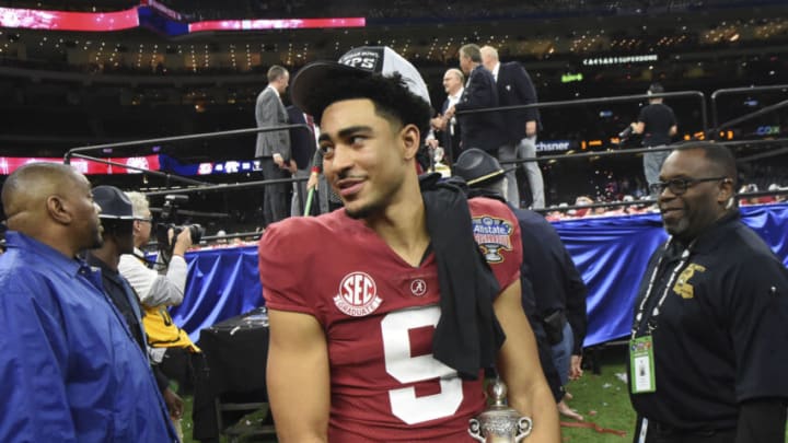 Dec 31, 2022; New Orleans, LA, USA; Alabama quarterback Bryce Young (9) carries away the MVP trophy after throwing five touchdown passes during the 2022 Sugar Bowl at Caesars Superdome. Alabama defeated Kansas State 45-20. Mandatory Credit: Gary Cosby Jr.-USA TODAY Sports