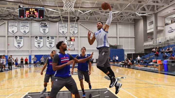 STOCKTON, NJ - SEPTEMBER 27: Ben Simmons #25 of the Philadelphia 76ers dunks the ball during practice at Stockton University on September 27, 2016 in Camden, New Jersey. NOTE TO USER: User expressly acknowledges and agrees that, by downloading and/or using this Photograph, user is consenting to the terms and conditions of the Getty Images License Agreement. Mandatory Copyright Notice: Copyright 2016 NBAE (Photo by Jesse D. Garrabrant NBAE via Getty Images)