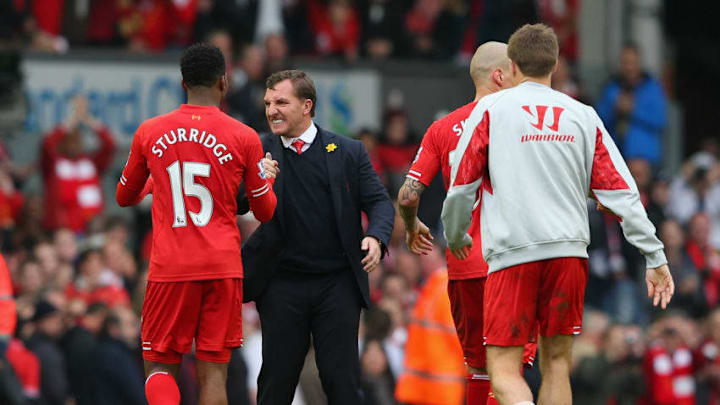 LIVERPOOL, ENGLAND - MARCH 30: Liverpool Manager Brendan Rodgers congratulates Daniel Sturridge of Liverpool at the end of the Barclays Premier League match between Liverpool and Tottenham Hotspur at Anfield on March 30, 2014 in Liverpool, England. (Photo by Alex Livesey/Getty Images)
