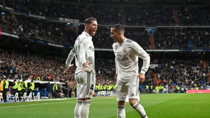 Real Madrid's Spanish defender Sergio Ramos (L) Real Madrid's Spanish midfielder Lucas Vazquez after scoring during the Spanish Copa del Rey (King's Cup) quarter-final first leg football match between Real Madrid CF and Girona FC at the Santiago Bernabeu stadium in Madrid on January 24, 2019. (Photo by JAVIER SORIANO / AFP) (Photo credit should read JAVIER SORIANO/AFP/Getty Images)