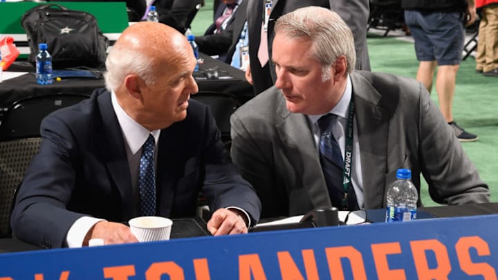 DALLAS, TX - JUNE 22: President of Hockey Operations Lou Lamoriello of the New York Islanders (L) talks with Garth Snow during the first round of the 2018 NHL Draft at American Airlines Center on June 22, 2018 in Dallas, Texas. (Photo by Brian Babineau/NHLI via Getty Images)