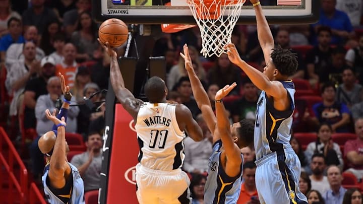 Nov 26, 2016; Miami, FL, USA; Miami Heat guard Dion Waiters (11) shoots the ball around Memphis Grizzlies guard Andrew Harrison (5) during the first half at American Airlines Arena. Mandatory Credit: Jasen Vinlove-USA TODAY Sports