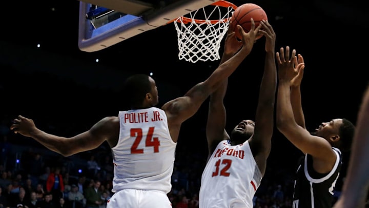 DAYTON, OH - MARCH 13: Ed Polite Jr. #24 of the Radford Highlanders and Randy Phillips #32 of the Radford Highlanders attempt to keep the ball away from Raiquan Clark #23 of the LIU Brooklyn Blackbirds during the game at UD Arena on March 13, 2018 in Dayton, Ohio. (Photo by Kirk Irwin/Getty Images) DAYTON, OH - MARCH 13: Ed Polite Jr. #24 of the Radford Highlanders and Randy Phillips #32 of the Radford Highlanders attempt to keep the ball away from Raiquan Clark #23 of the LIU Brooklyn Blackbirds during the game at UD Arena on March 13, 2018 in Dayton, Ohio. (Photo by Kirk Irwin/Getty Images)