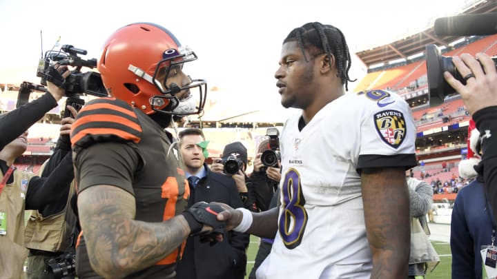 CLEVELAND, OHIO – DECEMBER 22: Wide receiver Odell Beckham #13 of the Cleveland Browns shakes hands with quarterback Lamar Jackson #8 of the Baltimore Ravens after the game at FirstEnergy Stadium on December 22, 2019 in Cleveland, Ohio. The Ravens defeated the Browns 31-15. (Photo by Jason Miller/Getty Images)