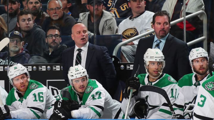 BUFFALO, NY - OCTOBER 14: Head coach Jim Montgomery of the Dallas Stars (left) watches the action during an NHL game against the Buffalo Sabres on October 14, 2019 at KeyBank Center in Buffalo, New York. Buffalo won, 4-0. (Photo by Bill Wippert/NHLI via Getty Images)