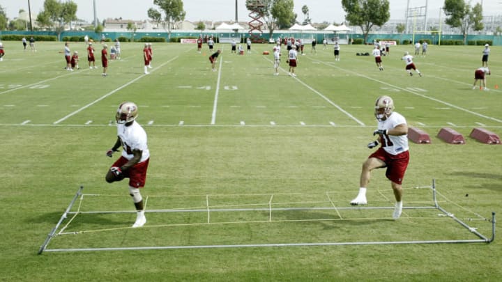 SANTA CLARA, CA - JULY 29: The San Francisco 49ers run their drills on the practice field during training camp at the 49ers practice facilities on July 29, 2003 in Santa Clara, California. (Photo by Jed Jacobsohn/Getty Images)