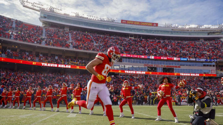 KANSAS CITY, MO - DECEMBER 24: Travis Kelce #87 of the Kansas City Chiefs runs onto the field during player introductions prio to the game against the Seattle Seahawks at Arrowhead Stadium on December 24, 2022 in Kansas City, Missouri. (Photo by David Eulitt/Getty Images)