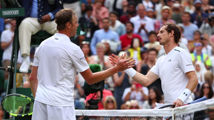 LONDON, ENGLAND - JULY 12: Andy Murray of Great Britain and Sam Querrey of The United States shake hands after the Gentlemen's Singles quarter final match on day nine of the Wimbledon Lawn Tennis Championships at the All England Lawn Tennis and Croquet Club on July 12, 2017 in London, England. (Photo by Clive Brunskill/Getty Images)