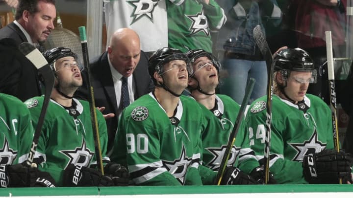 DALLAS, TX - OCTOBER 19: Jason Spezza #90 of the Dallas Stars gets a word of encouragement from his coach Jim Montgomery after he scores a goal against the Minnesota Wild at the American Airlines Center on October 19, 2018 in Dallas, Texas. (Photo by Glenn James/NHLI via Getty Images)