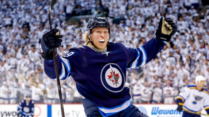 WINNIPEG, MB - APRIL 10: Patrik Laine #29 of the Winnipeg Jets celebrates after scoring a first period goal against the St. Louis Blues in Game One of the Western Conference First Round during the 2019 NHL Stanley Cup Playoffs at the Bell MTS Place on April 10, 2019 in Winnipeg, Manitoba, Canada. (Photo by Darcy Finley/NHLI via Getty Images)