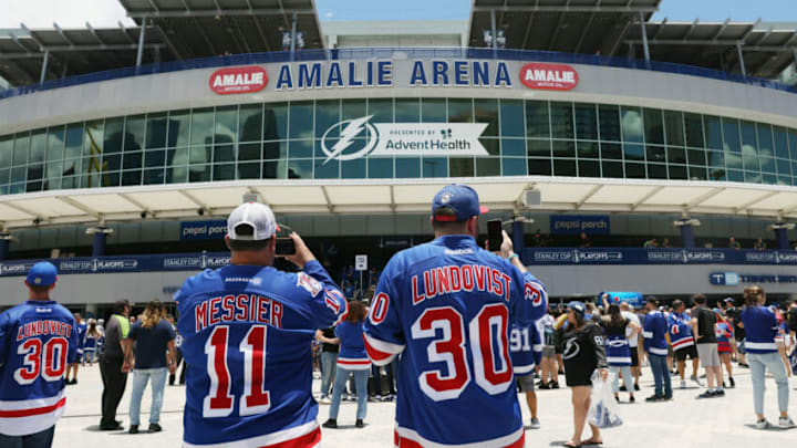 TAMPA, FLORIDA - JUNE 05: Fans arrive for the game between the New York Rangers and the Tampa Bay Lightning in Game Three of the Eastern Conference Final of the 2022 Stanley Cup Playoffs at Amalie Arena on June 05, 2022 in Tampa, Florida. (Photo by Bruce Bennett/Getty Images)