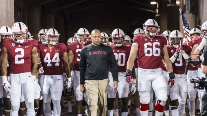 PALO ALTO, CA - SEPTEMBER 23: Stanford Cardinal head coach David Shaw leads his team into the stadium prior to an NCAA Pac-12 football game against the UCLA Bruins on September 23, 2017 at Stanford Stadium in Palo Alto, California. Visible players include Brandon Simmons PALO ALTO, CA - SEPTEMBER 23: Stanford Cardinal head coach David Shaw leads his team into the stadium prior to an NCAA Pac-12 football game against the UCLA Bruins on September 23, 2017 at Stanford Stadium in Palo Alto, California. Visible players include Brandon Simmons