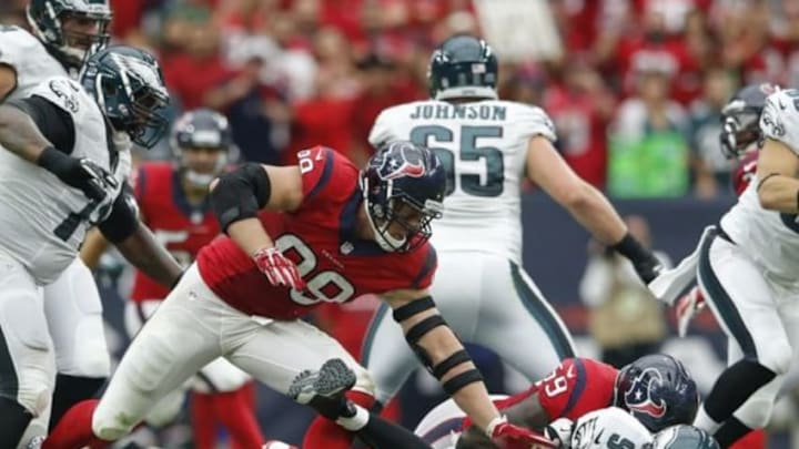 Nov 2, 2014; Houston, TX, USA; Houston Texans defensive end J.J. Watt (99) and outside linebacker Whitney Mercilus (59) tackle Philadelphia Eagles quarterback Nick Foles (9) during the first half at NRG Stadium. Mandatory Credit: Kevin Jairaj-USA TODAY Sports Nov 2, 2014; Houston, TX, USA; Houston Texans defensive end J.J. Watt (99) and outside linebacker Whitney Mercilus (59) tackle Philadelphia Eagles quarterback Nick Foles (9) during the first half at NRG Stadium. Mandatory Credit: Kevin Jairaj-USA TODAY Sports