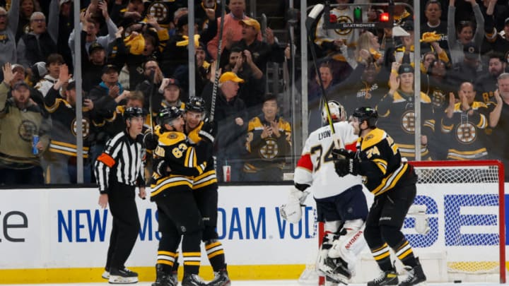 BOSTON, MA - APRIL 17: Brad Marchand #63 of the Boston Bruins celebrates his goal with his teammates Pavel Zacha #18 and Jake DeBrusk #74 against the Florida Panthers during the second period of Game One of the First Round of the 2023 Stanley Cup Playoffs at the TD Garden on April 17, 2023 in Boston, Massachusetts. (Photo by Rich Gagnon/Getty Images)