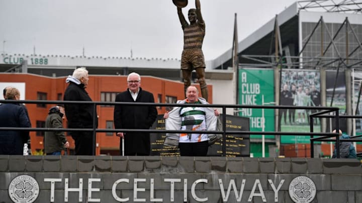 GLASGOW, SCOTLAND - MARCH 10: Fans gather as the funeral cortege of former Glasgow Celtic and Lisbon Lion footballer Tommy Gemmell, who died last Thursday aged 73, leaves Celtic Park on March 10, 2017 in Glasgow, Scotland. The Celtic great and Lisbon Lion, who won the European Cup with Celtic and was also capped eighteen times for Scotland, died on 2 March after a prolonged illness. (Photo by Jeff J Mitchell/Getty Images)