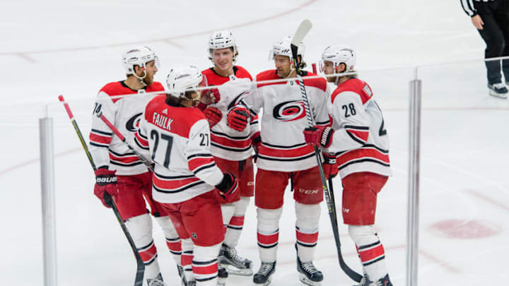 CHICAGO, IL - MARCH 08: Carolina Hurricanes celebrate a Carolina Hurricanes right wing Justin Williams (14) goal in the 2nd period during an NHL hockey game between the Carolina Hurricanes and the Chicago Blackhawks on March 08, 2018, at the United Center in Chicago, IL. (Photo By Daniel Bartel/Icon Sportswire via Getty Images)