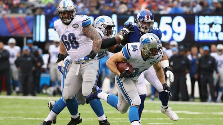 EAST RUTHERFORD, NJ - DECEMBER 18: Zach Zenner #34 of the Detroit Lions carries the ball against the New York Giants in the first half at MetLife Stadium on December 18, 2016 in East Rutherford, New Jersey. (Photo by Al Bello/Getty Images)