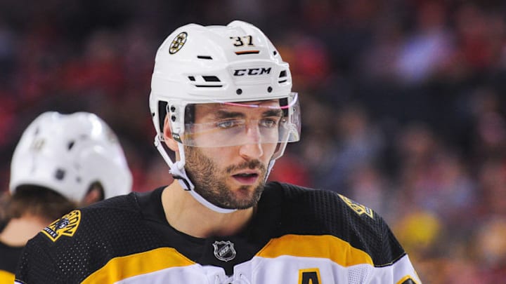 CALGARY, AB - OCTOBER 17: Patrice Bergeron #37 of the Boston Bruins in action against the Calgary Flames during an NHL game at Scotiabank Saddledome on October 17, 2018 in Calgary, Alberta, Canada. (Photo by Derek Leung/Getty Images)