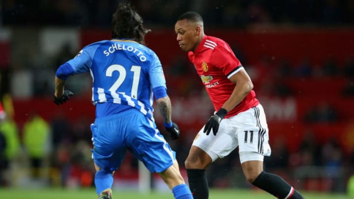 MANCHESTER, ENGLAND - MARCH 17: Anthony Martial of Manchester United is challenged by Matias Ezequiel Schelotto of Brighton during the Emirates FA Cup Quarter Final between Manchester United and Brighton & Hove Albion at Old Trafford on March 17, 2018 in Manchester, England. (Photo by Alex Livesey/Getty Images)