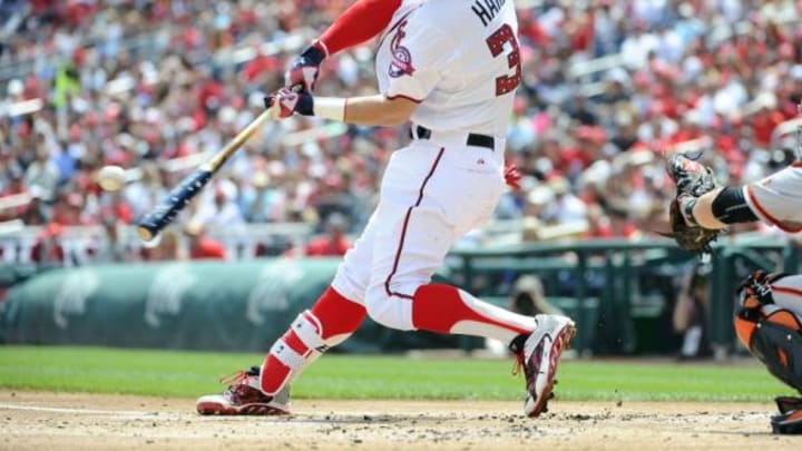 Jul 4, 2015; Washington, DC, USA; Washington Nationals right fielder Bryce Harper (34) hits a two run homer against the San Francisco Giants during the first inning at Nationals Park. Mandatory Credit: Brad Mills-USA TODAY Sports