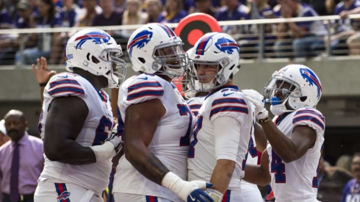 MINNEAPOLIS, MN - SEPTEMBER 23: Josh Allen #17 of the Buffalo Bills celebrates with teammates after scoring a touchdown in the first quarter of the game against the Minnesota Vikings at U.S. Bank Stadium on September 23, 2018 in Minneapolis, Minnesota.(Photo by Stephen Maturen/Getty Images)