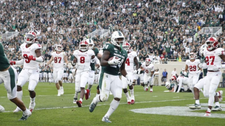 EAST LANSING, MI - SEPTEMBER 28: Elijah Collins #24 of the Michigan State Spartans runs for a four-yard touchdown in the first quarter against the Indiana Hoosiers at Spartan Stadium on September 28, 2019 in East Lansing, Michigan. (Photo by Joe Robbins/Getty Images)