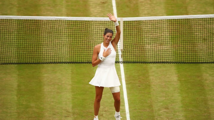 LONDON, ENGLAND - JULY 15: Garbine Muguruza of Spain celebrates victory after the Ladies Singles final against Venus Williams of The United States on day twelve of the Wimbledon Lawn Tennis Championships at the All England Lawn Tennis and Croquet Club at Wimbledon on July 15, 2017 in London, England. (Photo by Clive Brunskill/Getty Images)