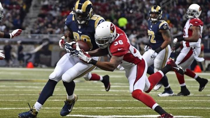 Dec 11, 2014; St. Louis, MO, USA; Arizona Cardinals strong safety Deone Bucannon (36) brings down St. Louis Rams tight end Jared Cook (89) during the first half at the Edward Jones Dome. Mandatory Credit: Jasen Vinlove-USA TODAY Sports Dec 11, 2014; St. Louis, MO, USA; Arizona Cardinals strong safety Deone Bucannon (36) brings down St. Louis Rams tight end Jared Cook (89) during the first half at the Edward Jones Dome. Mandatory Credit: Jasen Vinlove-USA TODAY Sports