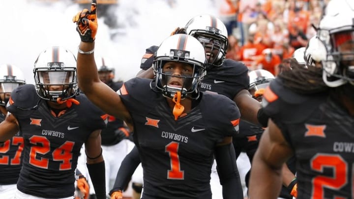 Oct 3, 2015; Stillwater, OK, USA; Oklahoma State Cowboys cornerback Kevin Peterson (1) reacts as his team enters the field before the start of a NCAA college football game against Kansas State at Boone Pickens Stadium. Mandatory Credit: Alonzo Adams-USA TODAY Sports