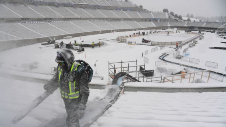 COLORADO SPRINGS, CO - FEBRUARY 7: Crews are moving snows from the stand during the ongoing buildout of the NHL Stadium Series outdoor game played at Falcon Stadium of Air Force Academy in Colorado Springs, Colorado on Friday. February 7, 2020. (Photo by Hyoung Chang/MediaNews Group/The Denver Post via Getty Images)