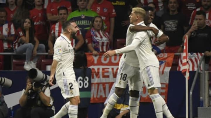 Real Madrid players celebrate after the second goal during the match between Atletico de Madrid and Real Madrid CF at the Wanda Metropolitano stadium in Madrid on September 18, 2022. (Photo by OSCAR DEL POZO/AFP via Getty Images)